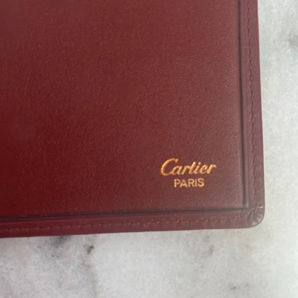 INTERNATIONAL WALLET WITH GUSSETS, MUST DE CARTIER